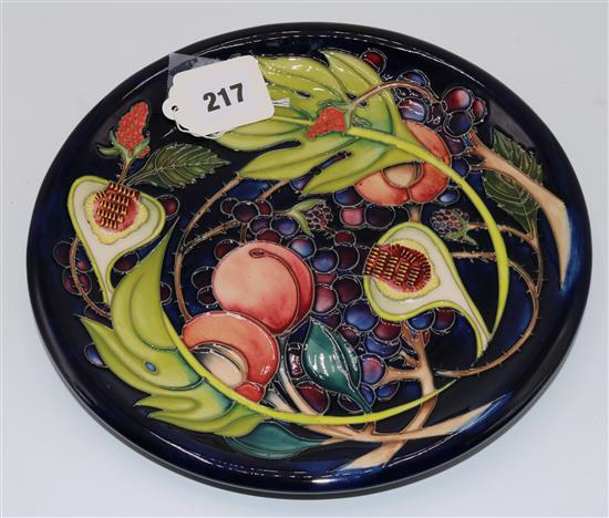A Moorcroft exotic fruit design dish, 2000